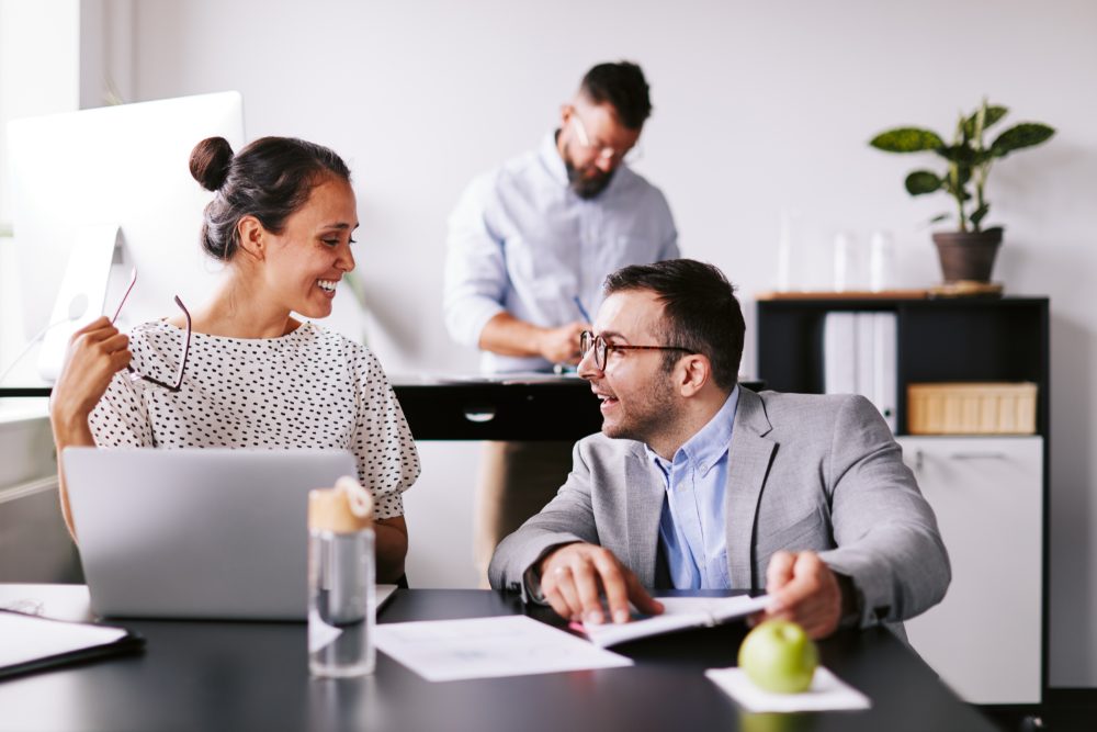 Business people interacting in an office